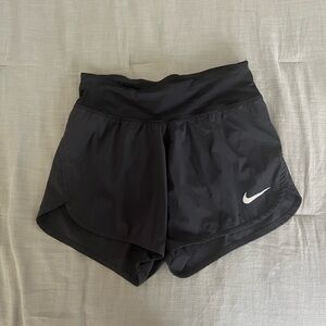 Black Nike running shorts